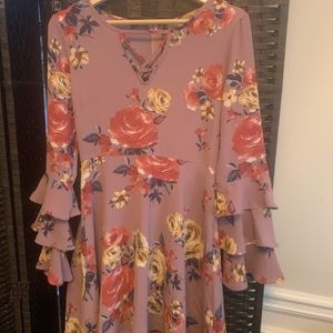 Top with flowers mid hip to top thigh length